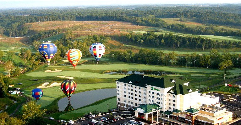 Holiday Inn at Blue Ridge Shadows aerial view with hot air balloons